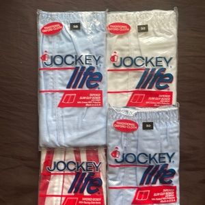 Jockey men’s tapered boxers (4) size 32. 100% nylon, quick drying             aa